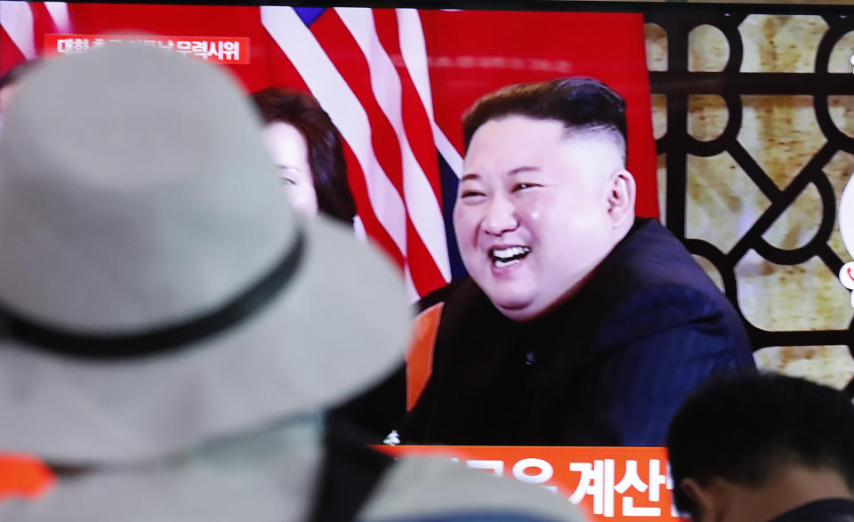 People watch a TV showing a file image of North Korean leader Kim Jong Un during a news program at the Seoul Railway Station in Seoul, South Korea, Tuesday, Sept. 10, 2019. North Korea launched at least two unidentified projectiles toward the sea on Tuesday, South Korea's military said, hours after the North offered to resume nuclear diplomacy with the United States but warned its dealings with Washington may end without new U.S. proposals. (AP Photo/Ahn Young-joon)