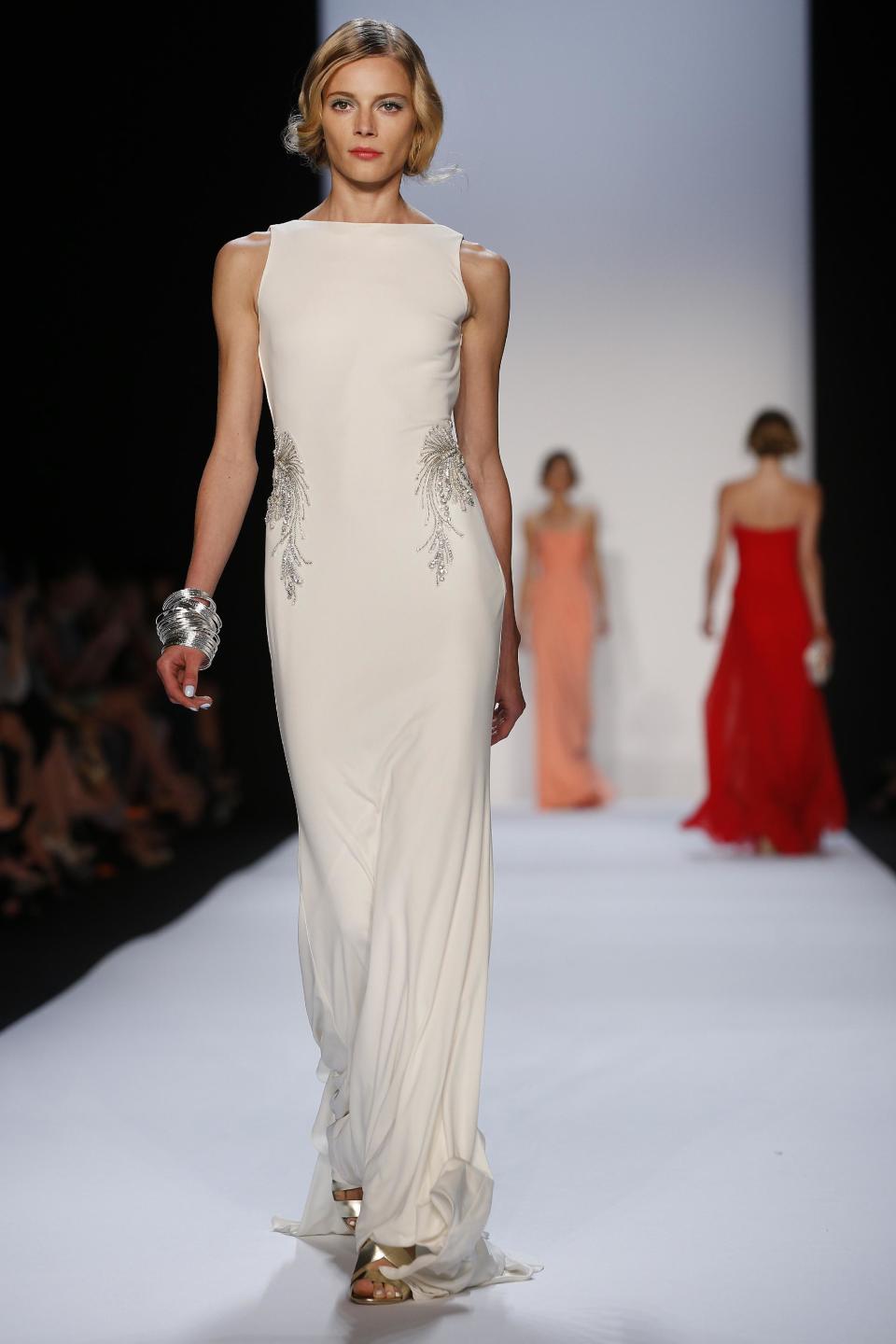 The Badgley Mischka Spring 2014 collection is modeled during Fashion Week in New York, Tuesday, Sept. 10, 2013. (AP Photo/John Minchillo)