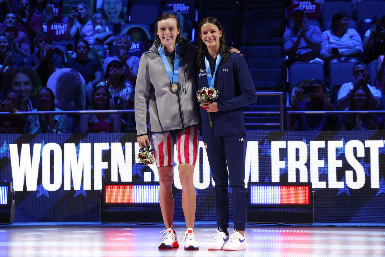 OMAHA, NEBRASKA - JUNE 19: Katie Ledecky and Katie Grimes react during the Women’s 800m freestyle medal ceremony during Day Seven of the 2021 U.S. Olympic Team Swimming Trials at CHI Health Center on June 19, 2021 in Omaha, Nebraska. (Photo by Al Bello/Getty Images)