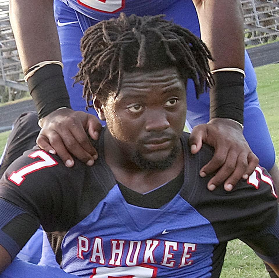 Pahokee High School football player Norman Griffith is shown on the field prior to a football game against Jupiter in Pahokee on Friday Sept. 26, 2008. A day later, Griffith was shot and killed in Belle Glade.