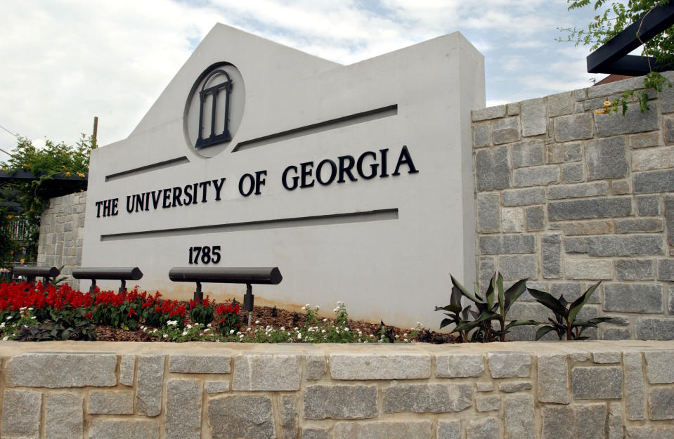 FILE - A sign for the University of Georgia is seen, May 28, 2004, in Athens, Ga. A woman was found dead Thursday, Feb. 22, 2024, on the campus of the University of Georgia after a friend told police she had not returned from a morning run, the university said. (AP Photo/Allen Sullivan, File)