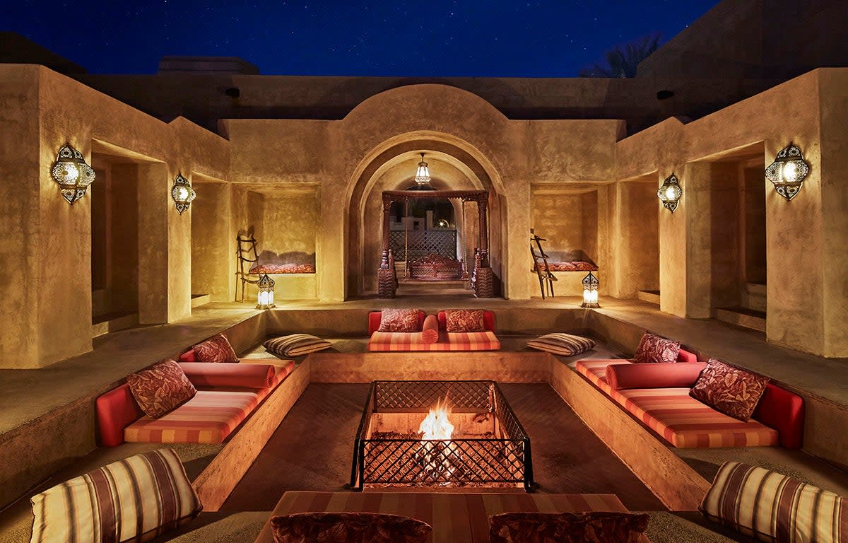 <p>The fire pit at Bab al Shams</p> (https://babalshams.com)