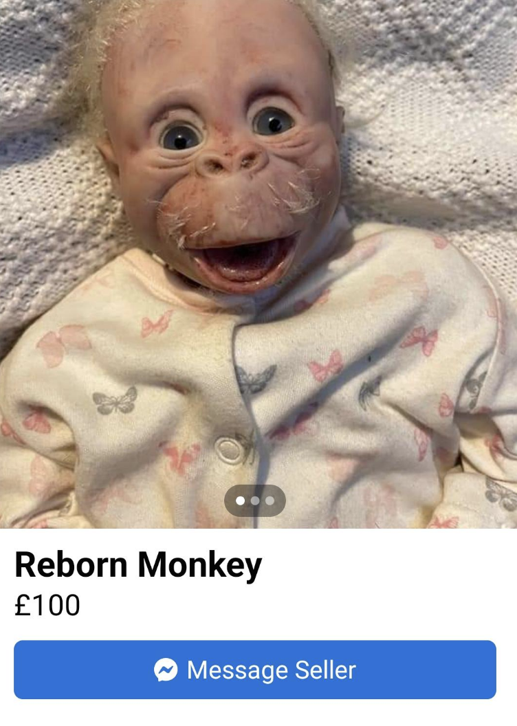 baby doll with a creepy monkey face