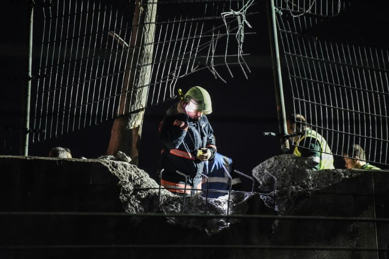 Forensic officers work at the site of an explosion on December 1 , 2015 at Bayrampasa district in Istanbul A station on the Istanbul metro was on December 1 rocked by a blast suspected to have been caused by a home-made bomb, causing panic in the evening rush hour and wounding up to half a dozen people