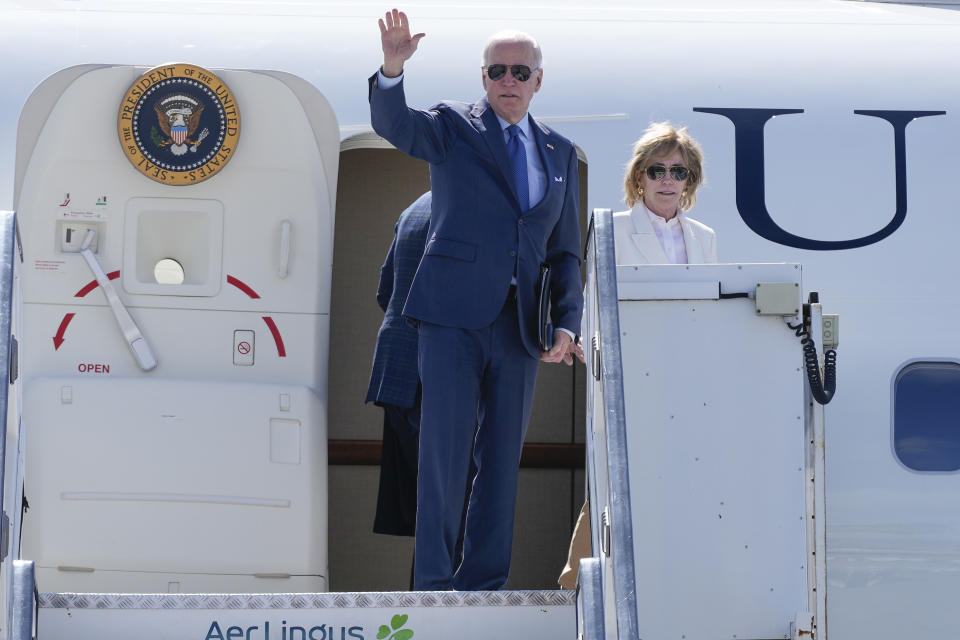 President Joe Biden boards Air Force One at Dublin International Airport in Dublin, Friday, April 14, 2023. Biden is en route to County Mayo, Ireland. At right is his sister Valerie Biden Owens. (AP Photo/Patrick Semansky)