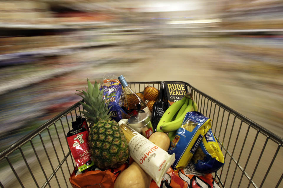 A shopping trolley is pushed around a supermarket in London, Britain May 19, 2015. Britain's annual rate of consumer price inflation fell below zero for the first time in more than half a century, official figures showed on Tuesday, though Bank of England Governor Mark Carney said the dip was likely to be brief. REUTERS/Stefan Wermuth  