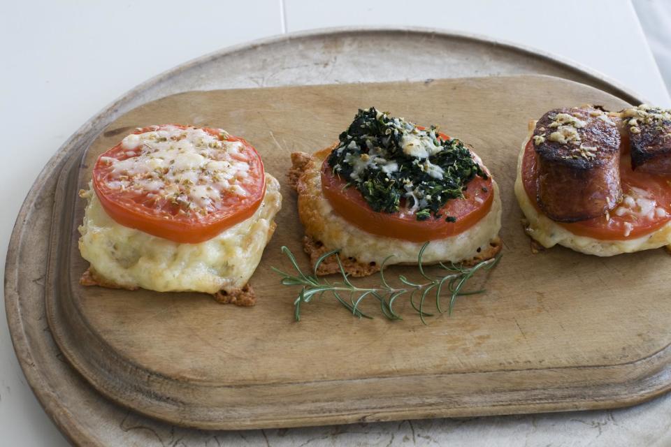 In this image taken on April 1, 2013, variations of an English muffin broiled cheese and tomato sandwich are shown in Concord, N.H. (AP Photo/Matthew Mead)