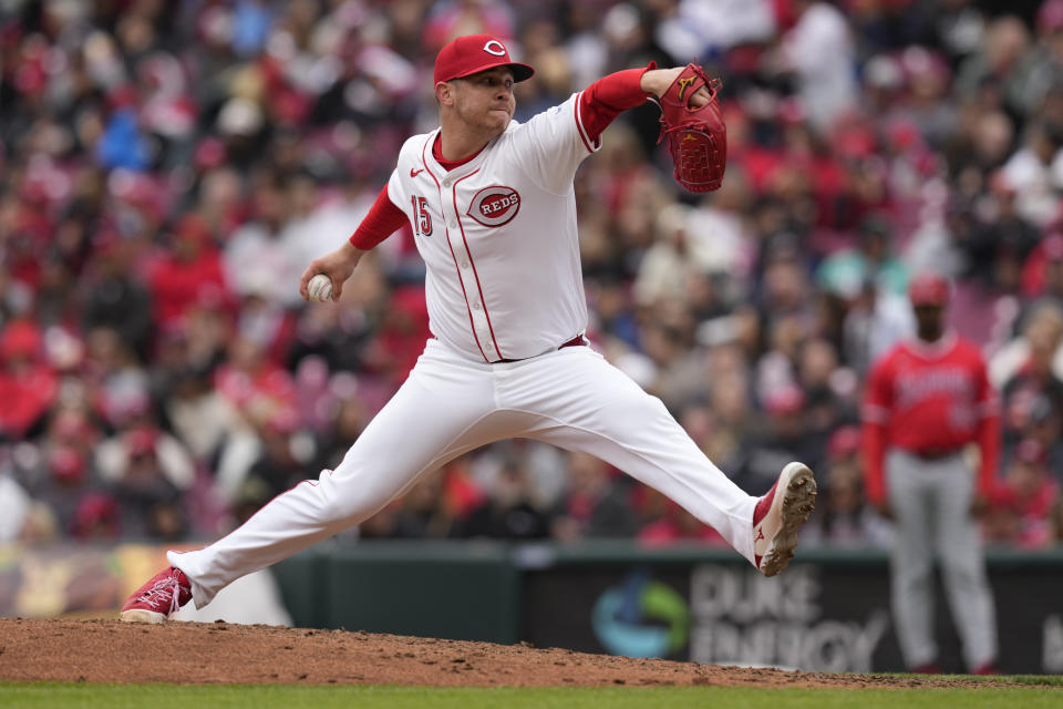 Cincinnati Reds pitcher Emilio Pagán throws in the fourth inning of a baseball game against the Los Angeles Angels, Sunday, April 21, 2024, in Cincinnati. (AP Photo/Carolyn Kaster)