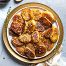 <p>Crispy, buttery, cheesy, garlicky potatoes--what else could you ask for? Serve these melt-in-your-mouth potatoes alongside steak, pork chops, chicken or fish. If you have leftovers, throw them into a breakfast scramble the next morning. <a href="https://www.eatingwell.com/recipe/280315/garlic-parmesan-melting-potatoes/" rel="nofollow noopener" target="_blank" data-ylk="slk:View Recipe;elm:context_link;itc:0;sec:content-canvas" class="link ">View Recipe</a></p>