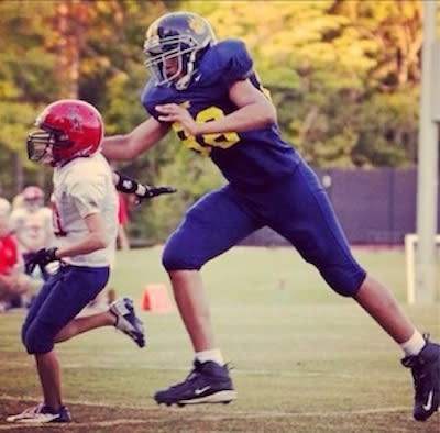 6-foot-7 Isiah Stokes in an 8th grade football game — Instagram
