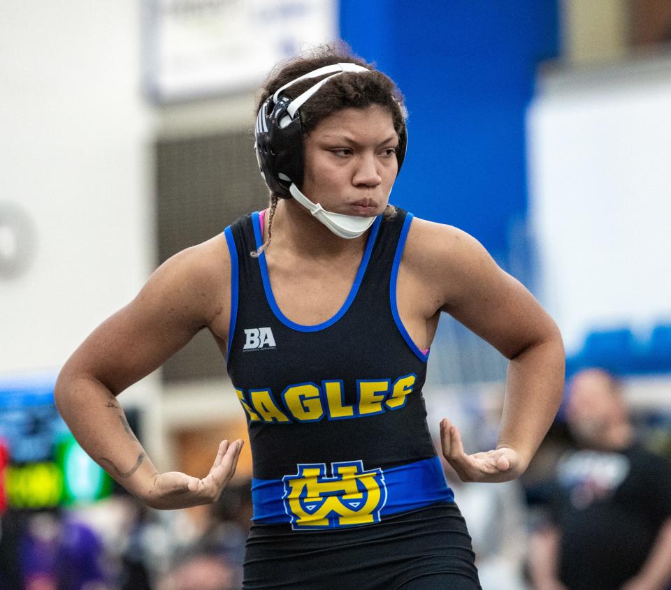 Walnut Hills’ Erin Martin pauses during her match with Aubrey Reese of Marysville and went on to win the 155-pound state title Feb. 20, 2022, at Hilliard Davidson.