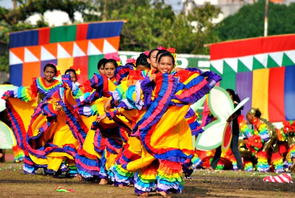 Zamboanga city is marketed as Asia's Latin city. One of the highlights of the Hermosa Festival is the street dance competition participated by different schools, held a day before the actual fiesta, October 12. Dancers are dressed in the traditional Hispanic costumes; they are seen in Flamenco dresses, Fallera dresses, ruffled skirts, butterfly sleeve, mantilla, peineta comb, barong, and sombrero cordobés. (Photo by Gael Hilotin)