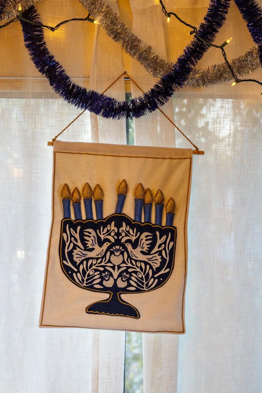 Adam Kulbersh is the founder of Project Menorah prepares for Chanukah.