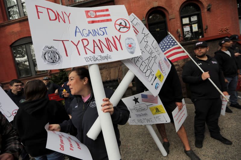 FILE PHOTO: Union firefighters and others protest against mandated vaccines in New York City