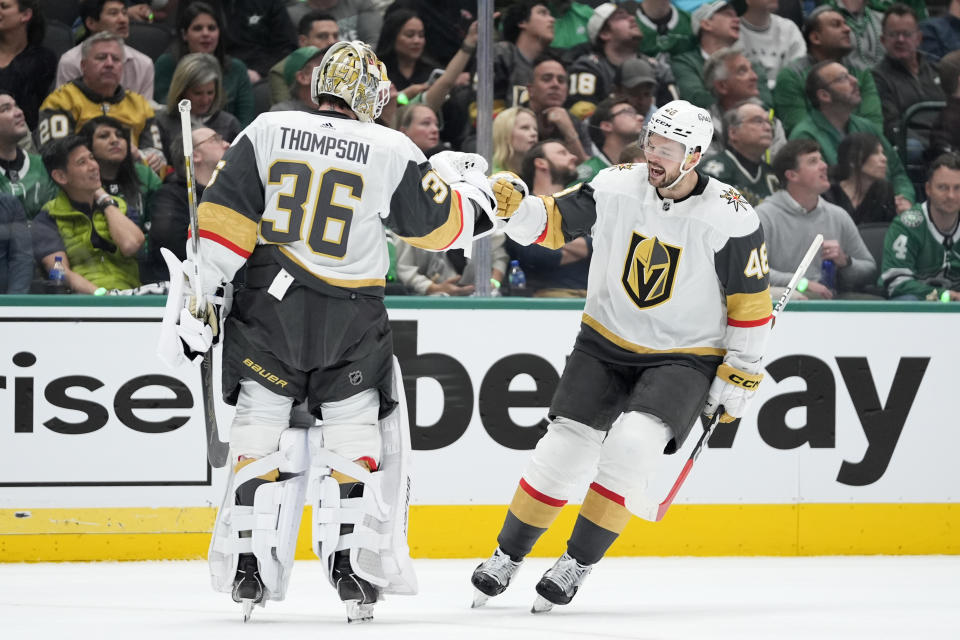 Vegas Golden Knights goaltender Logan Thompson (36) and center Tomas Hertl (48) celebrate after Hertl's goal in the first period in Game 1 of an NHL hockey Stanley Cup first-round playoff series against the Dallas Stars in Dallas, Monday, April 22, 2024. (AP Photo/Tony Gutierrez)