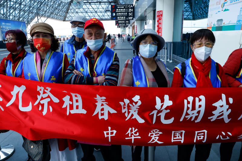 Supporter gather outside the airport to welcome former Taiwan President Ma Ying-jeou's visit to China in Taoyuan