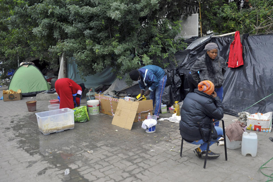 Sub-saharan migrants camp in front of the International Organization for Migration office as they seeks shelter and protection amidst attacks on them, in Tunis, Tunisia, Thursday, March 2, 2023. (AP Photo/Hassene Dridi)