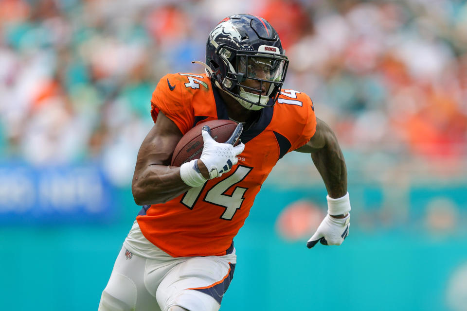 Sep 24, 2023; Miami Gardens, Florida, USA; Denver Broncos wide receiver Courtland Sutton (14) runs with the ball against the Miami Dolphins in the third quarter at Hard Rock Stadium. Mandatory Credit: Nathan Ray Seebeck-USA TODAY Sports
