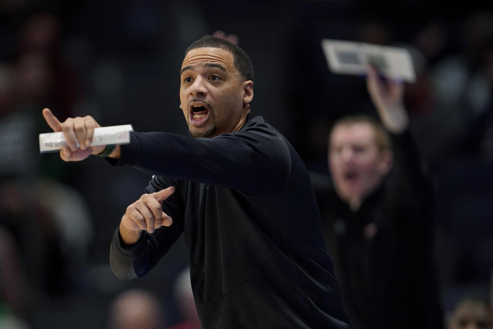 Wagner coach Donald Copeland gestures during the first half of the team's First Four college basketball game against Howard in the men's NCAA Tournament, Tuesday, March 19, 2024, in Dayton, Ohio. (AP Photo/Jeff Dean)