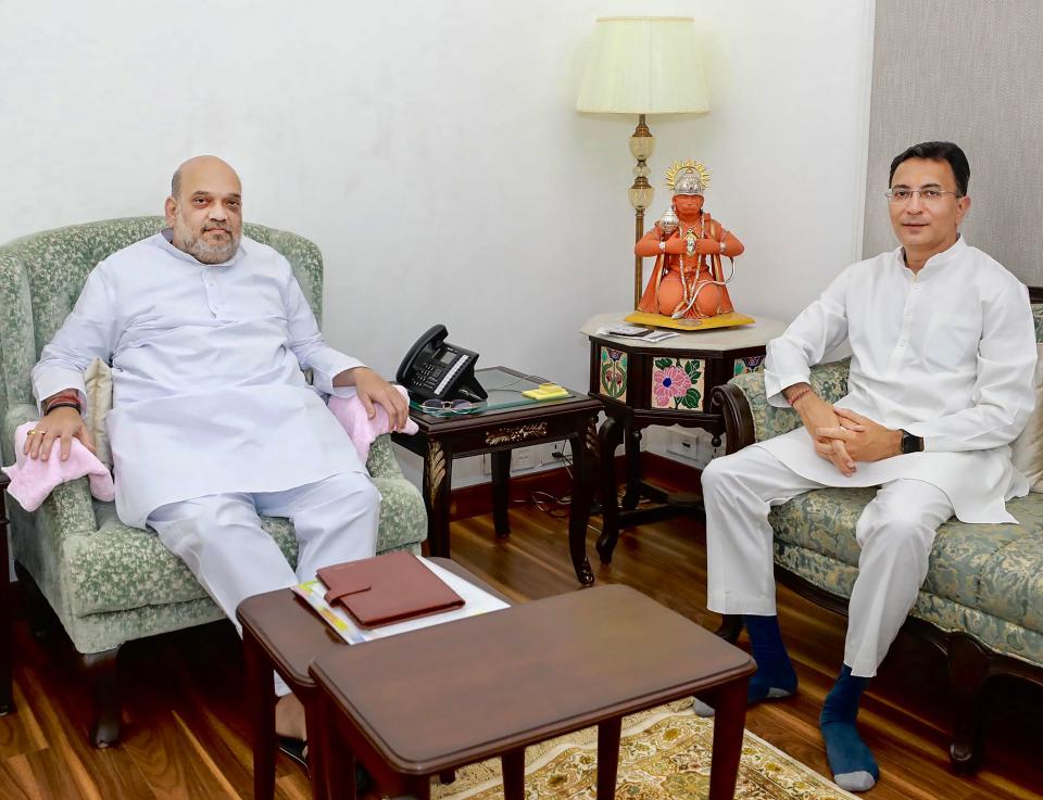 Former Congress leader Jitin Prasada meets Home Minister Amit Shah before joining the BJP, in New Delhi on Wednesday, 9 June.