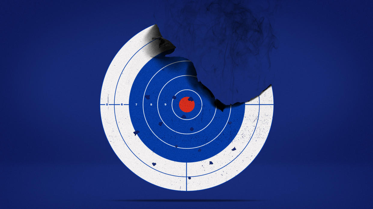  Illustration of a shooting target in the colours of the Russian flag, partially burnt and marked with bullet holes. 