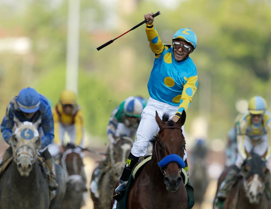 FILE – Victor Espinoza rides American Pharoah to victory in the 141st running of the Kentucky Derby horse race at Churchill Downs Saturday, May 2, 2015, in Louisville, Ky. “There’s nothing like winning the Kentucky Derby,” Espinoza, a three-time winner, said recently. “To me it’s the most important thing in horse racing.” (AP Photo/Darron Cummings, File)