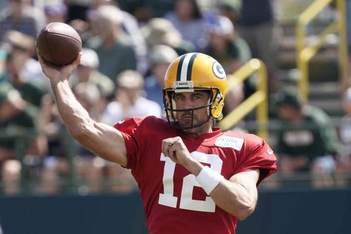 Green Bay Packers' Aaron Rodgers runs a drill before an NFL football joint practice session with the New Orleans Saints Tuesday, Aug. 16, 2022, in Green Bay, Wis. (AP Photo/Morry Gash)