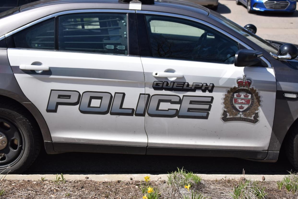 A Guelph Police Service cruiser sits on a residential street in Guelph on Sunday, May 3, 2020. (Kate Bueckert/CBC - image credit)