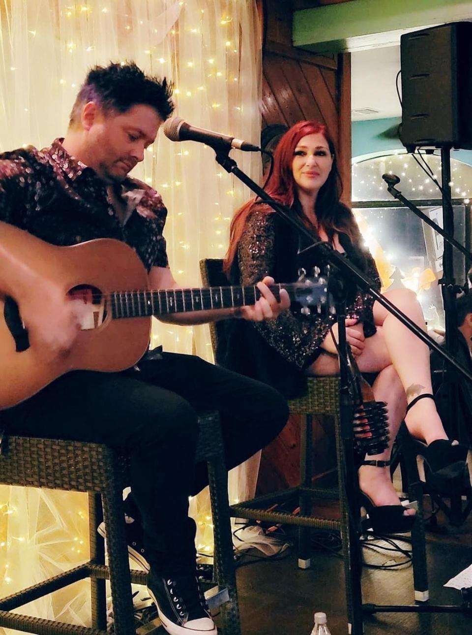 Pop star Tiffany (right) performs an acoustic song on New Year's Eve at The Anchor, a restaurant in Flagler Beach.