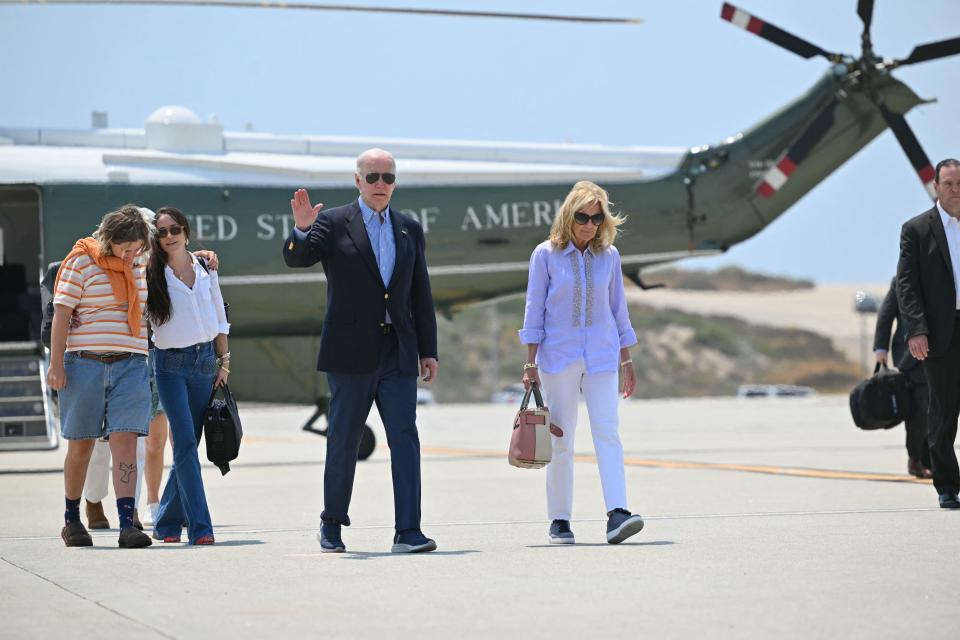 President Joe Biden and First Lady Jill Biden with daughter Ashley and granddaughters Maisy make their way to board Air Force One before departing Los Angeles International Airport in Los Angeles, California on June 16, 2024.