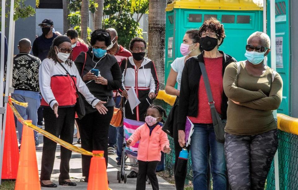 People lined up to be vaccinated at a Miami-Dade County mobile vaccination unit administering doses of the Pfizer vaccine from 8 a.m. to 3 p.m. at the South Miami Children’s Clinic, on March 20, 2021.