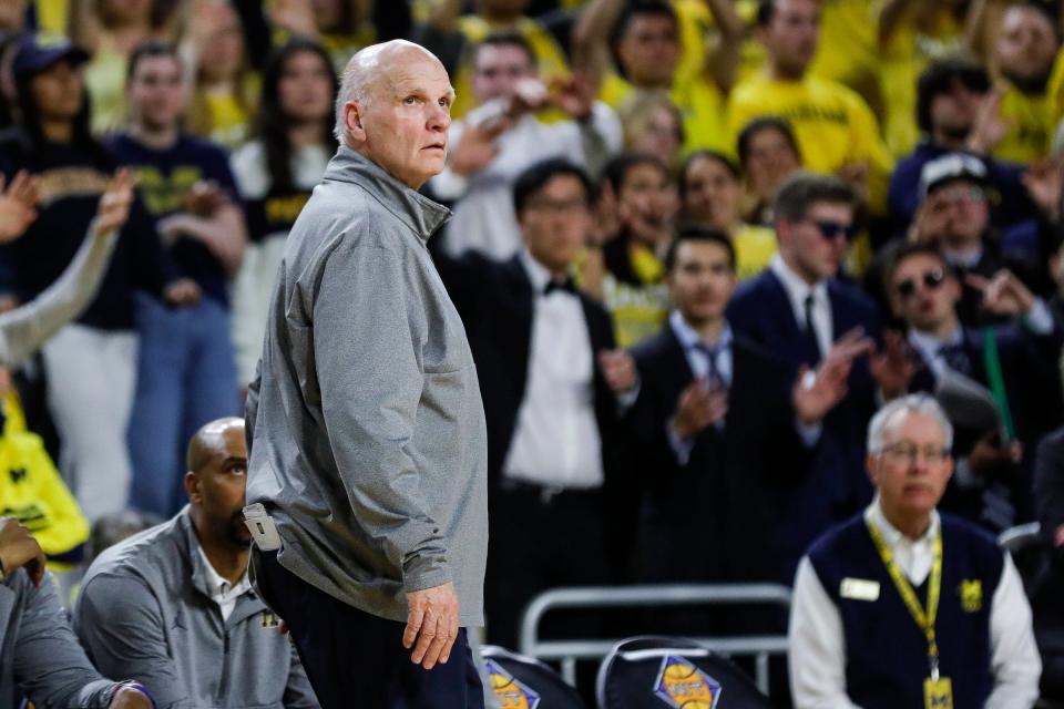 Michigan associate head coach Phil Martelli watches a play against Toledo during the second half of the first round of the NIT at Crisler Center in Ann Arbor on Tuesday, March 14, 2023.