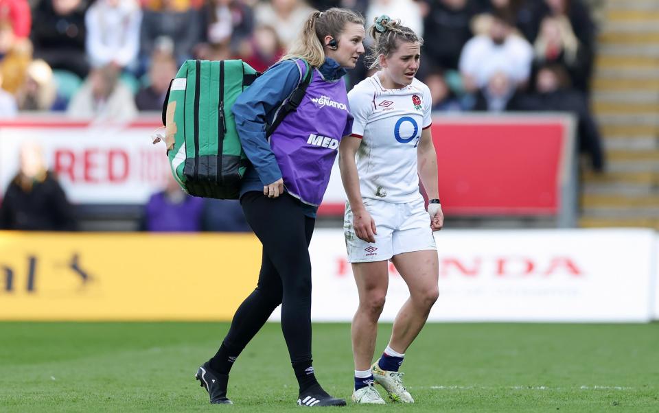 Claudia MacDonald leaves the field with an injury - Abby Dow scores four tries as Italy are thrashed by rampant Red Roses - Catherine Ivill/Getty Images