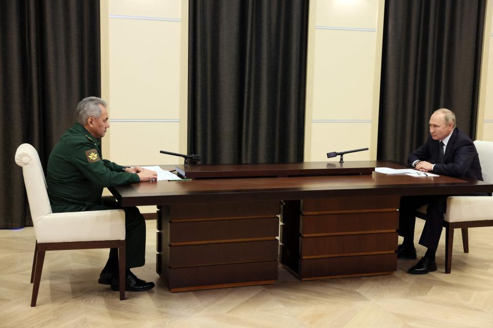 Russian President Vladimir Putin meets with Defense Minister Sergei Shoigu on October 28, 2022.