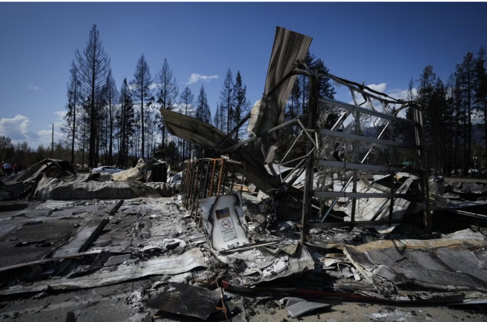 The burned remains of the Scotch Creek & Lee Creek Fire Department and community hall are seen in Scotch Creek, B.C. in September. (Darryl Dyck/The Canadian Press)