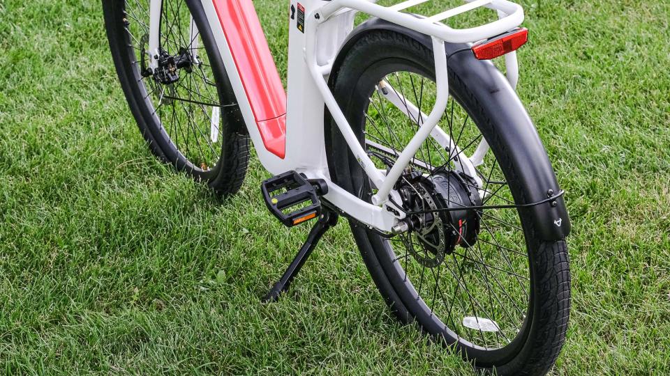 NIU BQi-C3 Pro E-bike parked on grass in park