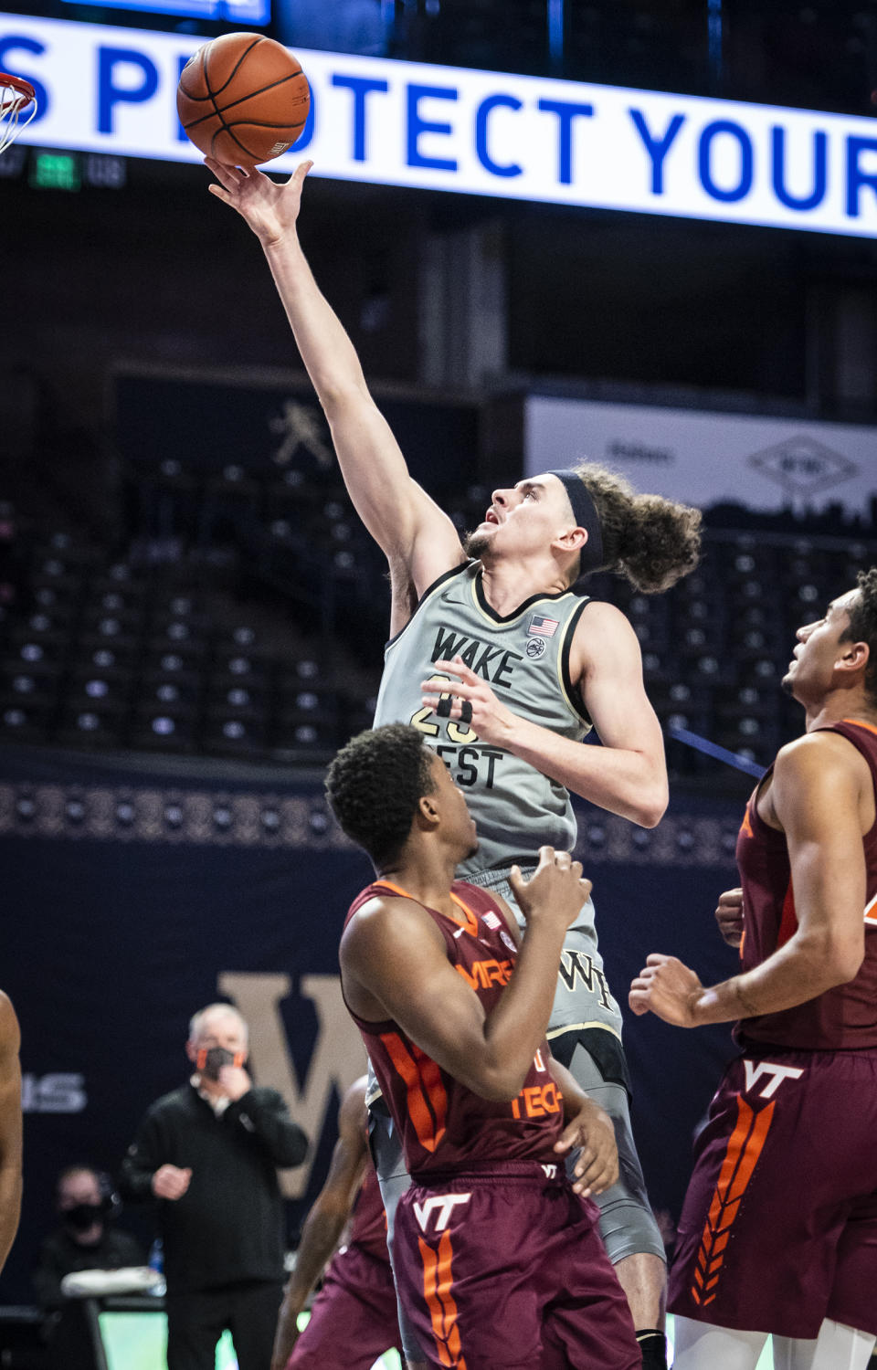 Wake Forest forward Ismael Massoud (25) shoots against Virginia Tech during an NCAA college basketball game Sunday, Jan. 17, 2021, in Winston-Salem, N.C. (Andrew Dye/The Winston-Salem Journal via AP)