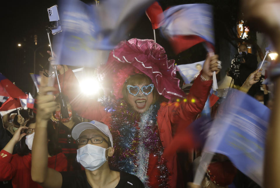 Supporters of Taiwan Kuomintang party Taipei city mayoral candidate Wayne Chiang cheer in Taipei, Taiwan, Saturday, Nov. 26, 2022. Lingering concerns about the threat posed by its giant neighbor China took a backseat in Taiwan''s closely watched local elections on Saturday as voters focused on other pressing issues closer to home such as air pollution and bad traffic. (AP Photo/Chiang Ying-ying)