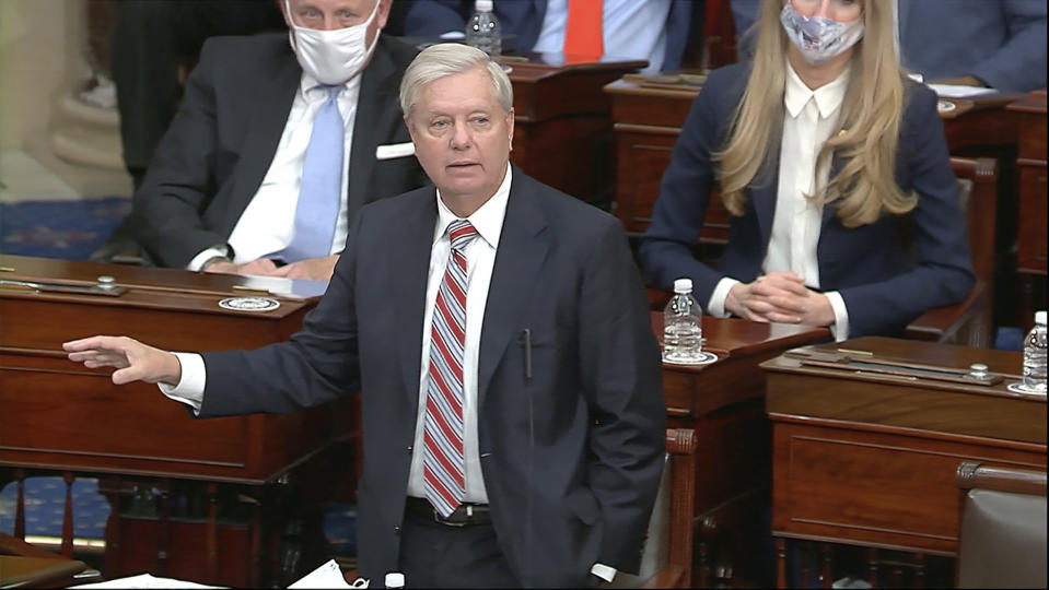 In this image from video, Sen. Lindsey Graham, R-S.C., speaks as the Senate reconvenes to debate the objection to confirm the Electoral College Vote from Arizona, after protesters stormed into the U.S. Capitol on Wednesday, Jan. 6, 2021. (Senate Television via AP)