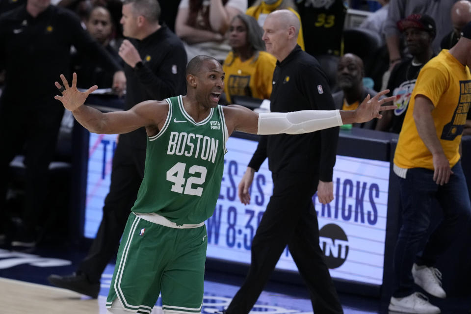 Boston Celtics center Al Horford (42) celebrates at the end of Game 4 of the NBA Eastern Conference basketball finals against the Indiana Pacers, Monday, May 27, 2024, in Indianapolis. The Celtics won 105-102.(AP Photo/Darron Cummings)