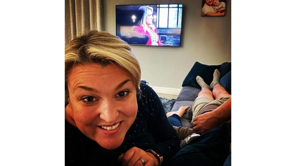 Sara Davies takes selfie on sofa at home in Newcastle