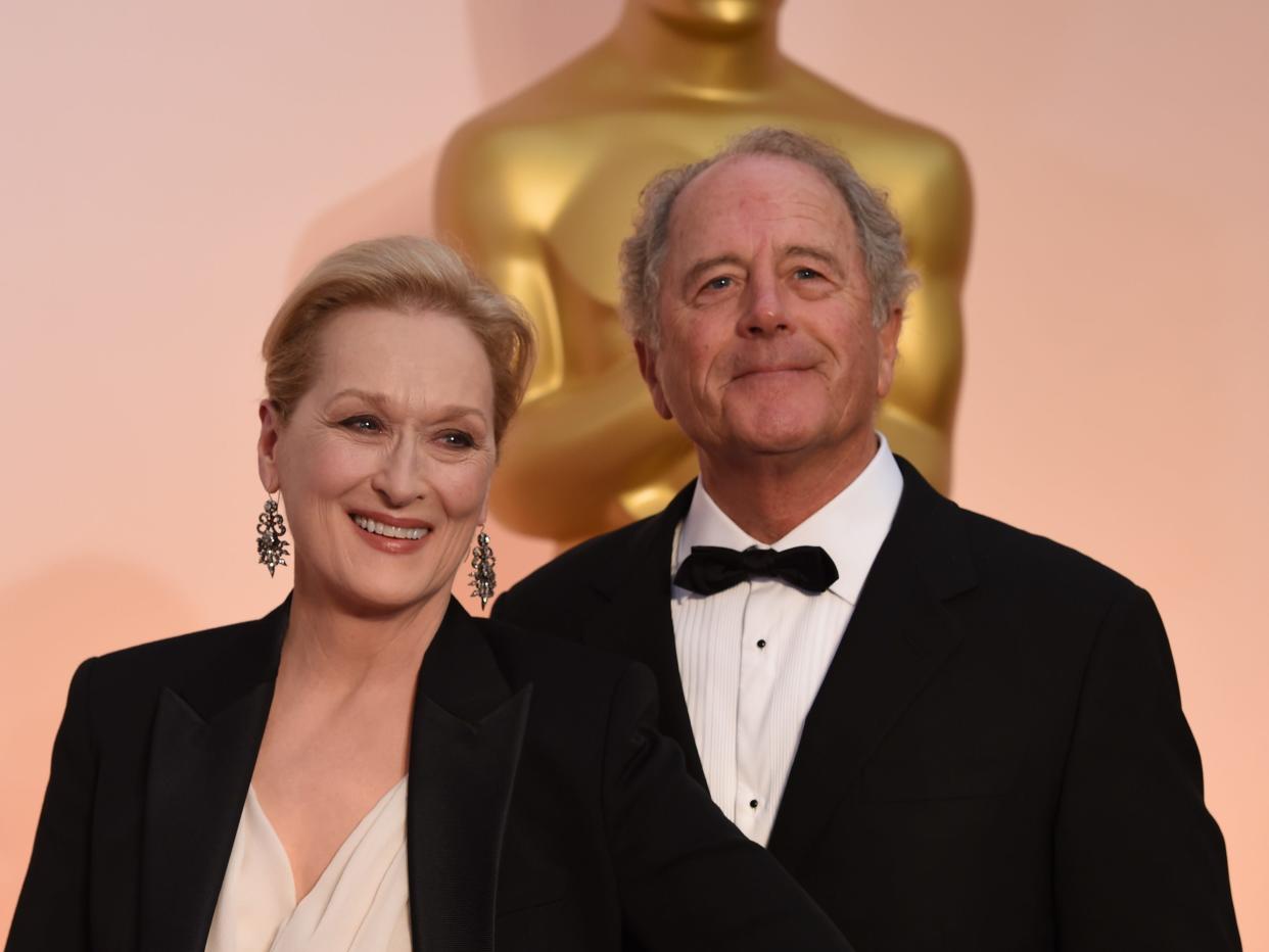 Meryl Streep and Don Gummer pose on the red carpet for the 87th Oscars on February 22, 2015.