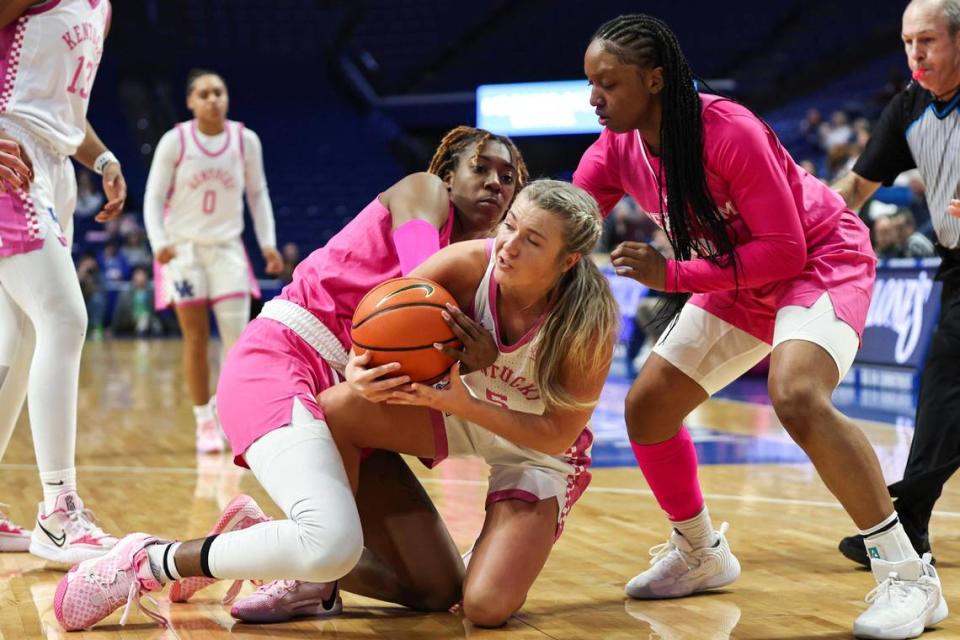 Kentucky guard Cassidy Rowe (5) recovers a loose ball against Texas A&M during Sunday’s game at Rupp Arena. UK lost its fifth game in a row and its eighth in nine games.