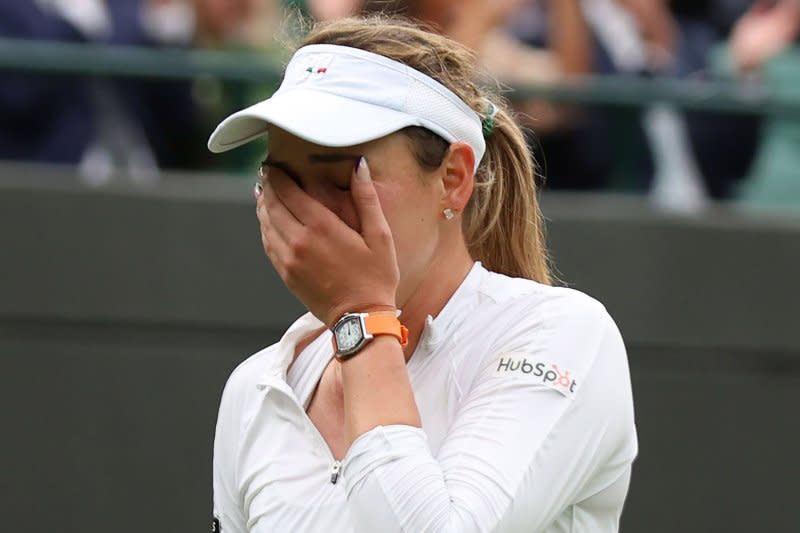 Croatia's Donna Vekic cries tears of joy after beating New Zealand's Lulu Sun in the Wimbledon 2024 quarterfinals Tuesday in London. Photo by Hugo Philpott/UPI