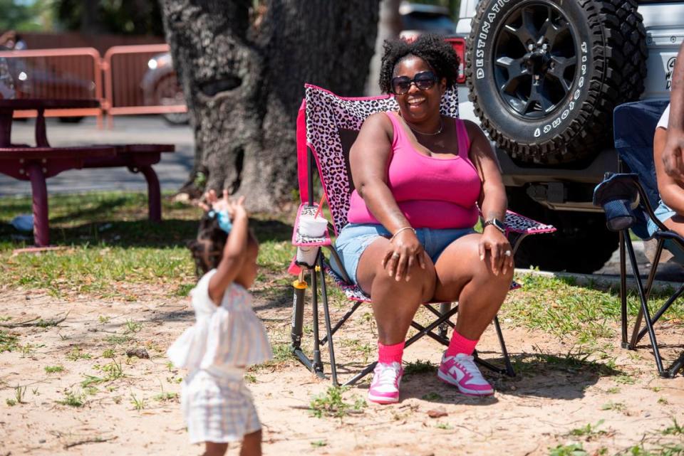 E’niyrie Ricard, 1, of Louisiana dances as San Newton watches during Black Spring Break in Biloxi on Saturday, April 13, 2024.