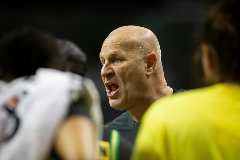 Oregon head coach Kelly Graves talks to his team during a timeout as the Oregon Ducks host Portland State Saturday, Dec. 9, 2023, at Matthew Knight Arena in Eugene, Ore.