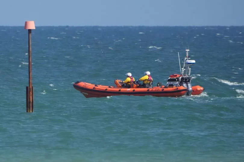 Helicopters and lifeboats took part in the rescue