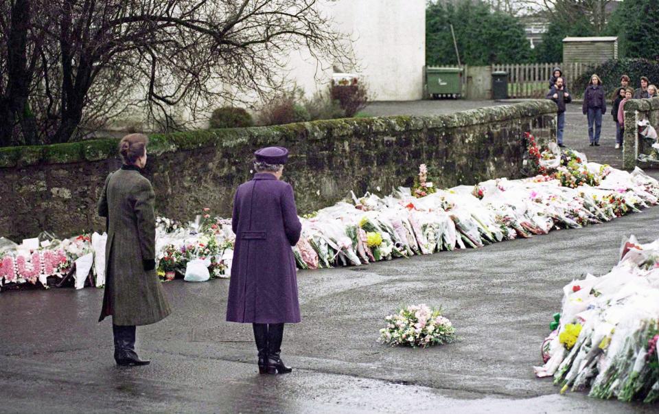 The Queen and Princess Anne at Dunblane Primary School in Scotland on March 17, 1996.