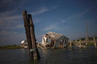 <p>A shanty, once used to sort through crabs, lies destroyed on Tangier Island, Virginia, Aug. 2, 2017. (Photo: Adrees Latif/Reuters) </p>