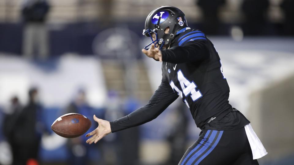 BYU’s Ryan Rehkow punts against <a class="link " href="https://sports.yahoo.com/ncaaf/teams/sdsu/" data-i13n="sec:content-canvas;subsec:anchor_text;elm:context_link" data-ylk="slk:San Diego State;sec:content-canvas;subsec:anchor_text;elm:context_link;itc:0">San Diego State</a> Saturday, Dec. 12, 2020, in Provo, Utah. | George Frey, Associated Press